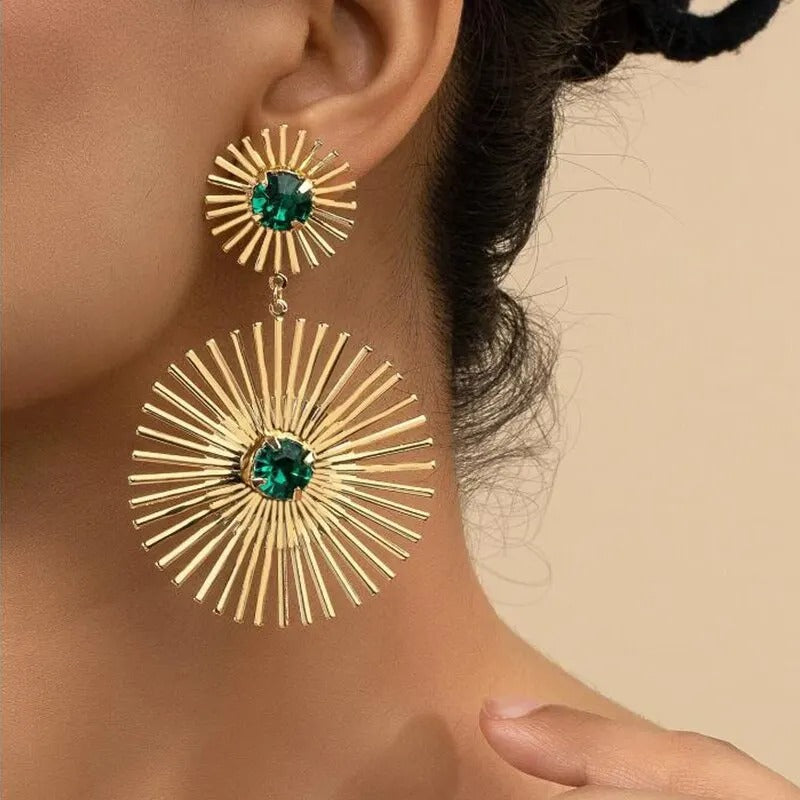 Radiant Sunburst Earrings with Emerald Center
